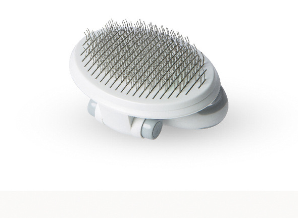 Self-cleaning wire brush for pets