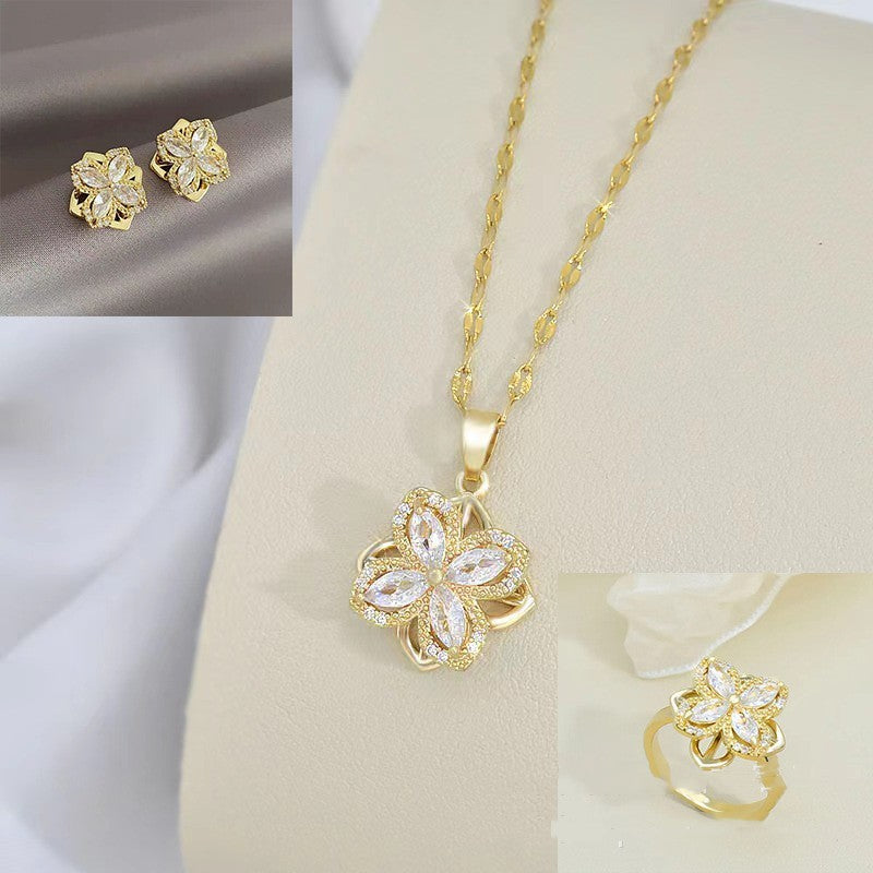 Rotatable Titanium Steel Four-petal Flower Necklace Female Inlaid Zircon Ring Earrings