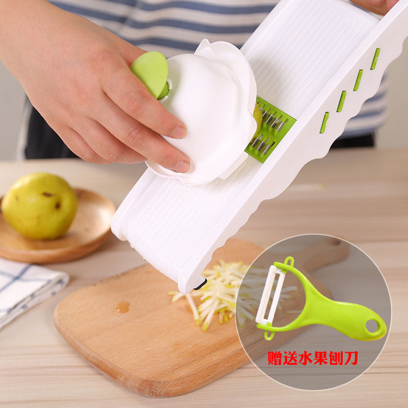 The  kitchen tools shredder multi-functional slicing and shredding device for household planing shredding device manual feed cutter